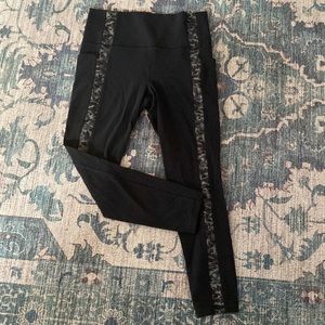 athleta leggings; black with camo stripes one each leg and two side pockets